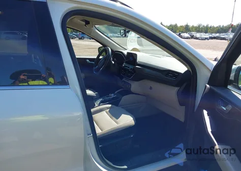 2020 Ford Escape Titanium z USA, uszkodzony, nr VIN 1FMCU9J98LUB15425